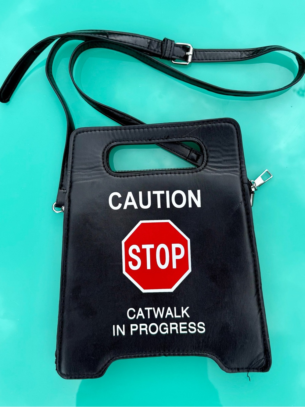 Black Graphic 'Caution Stop Cat Walk in Progress' Crossbody Bag